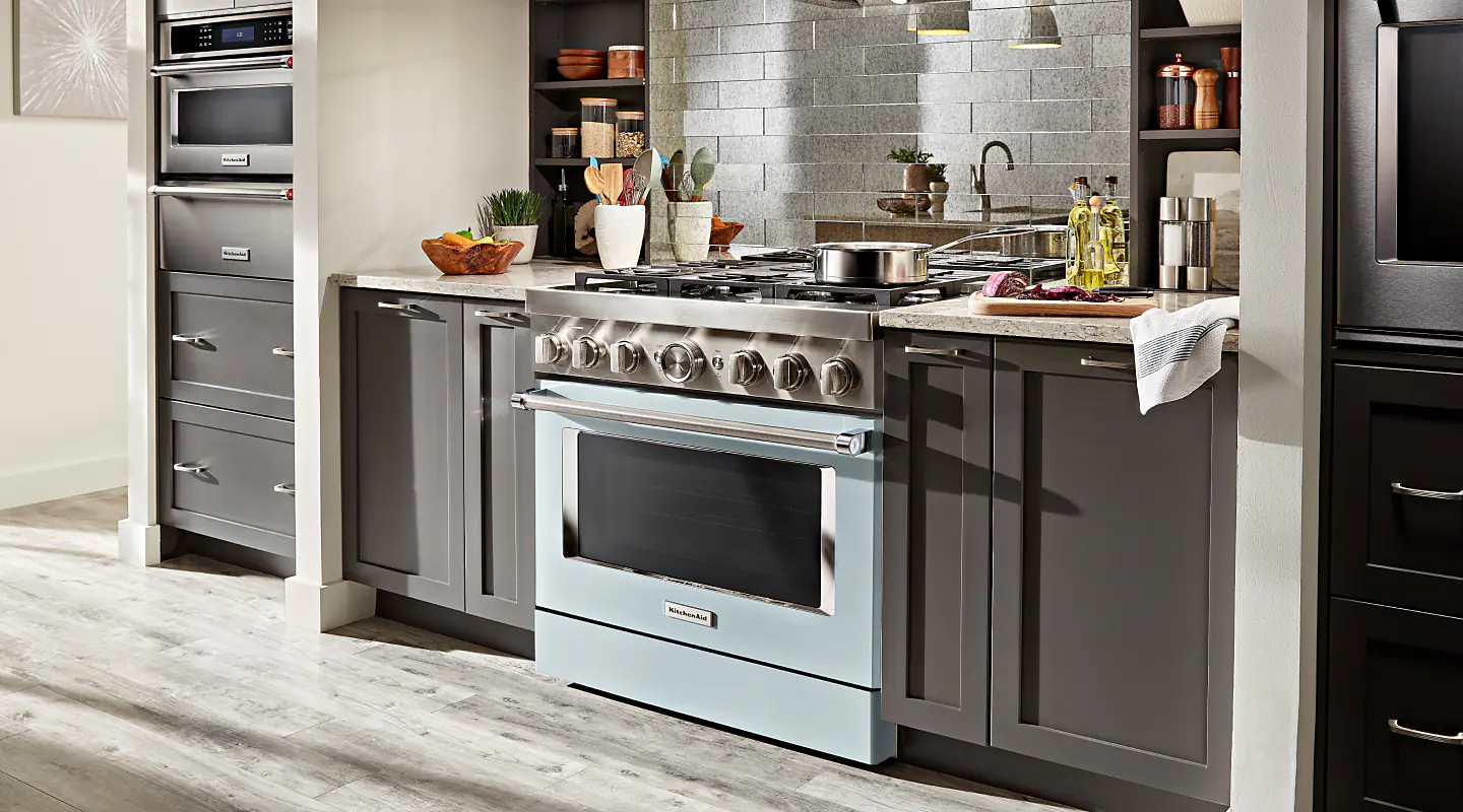 Blue KitchenAid® gas range installed in an updated kitchen Blue KitchenAid® gas range installed in an updated kitchen