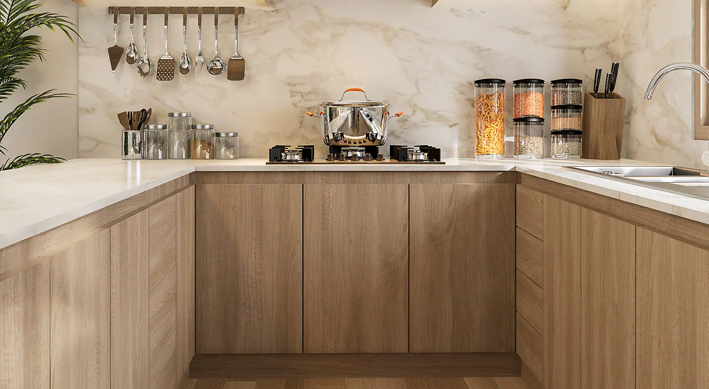 Light brown cabinetry with no handles on cabinets or drawers