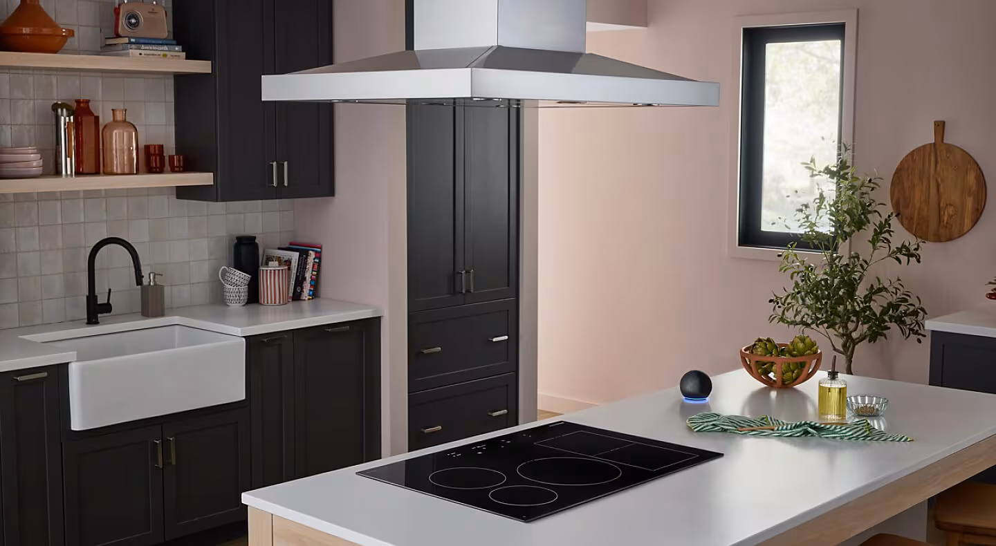 KitchenAid® cooktop in a white kitchen island countertop